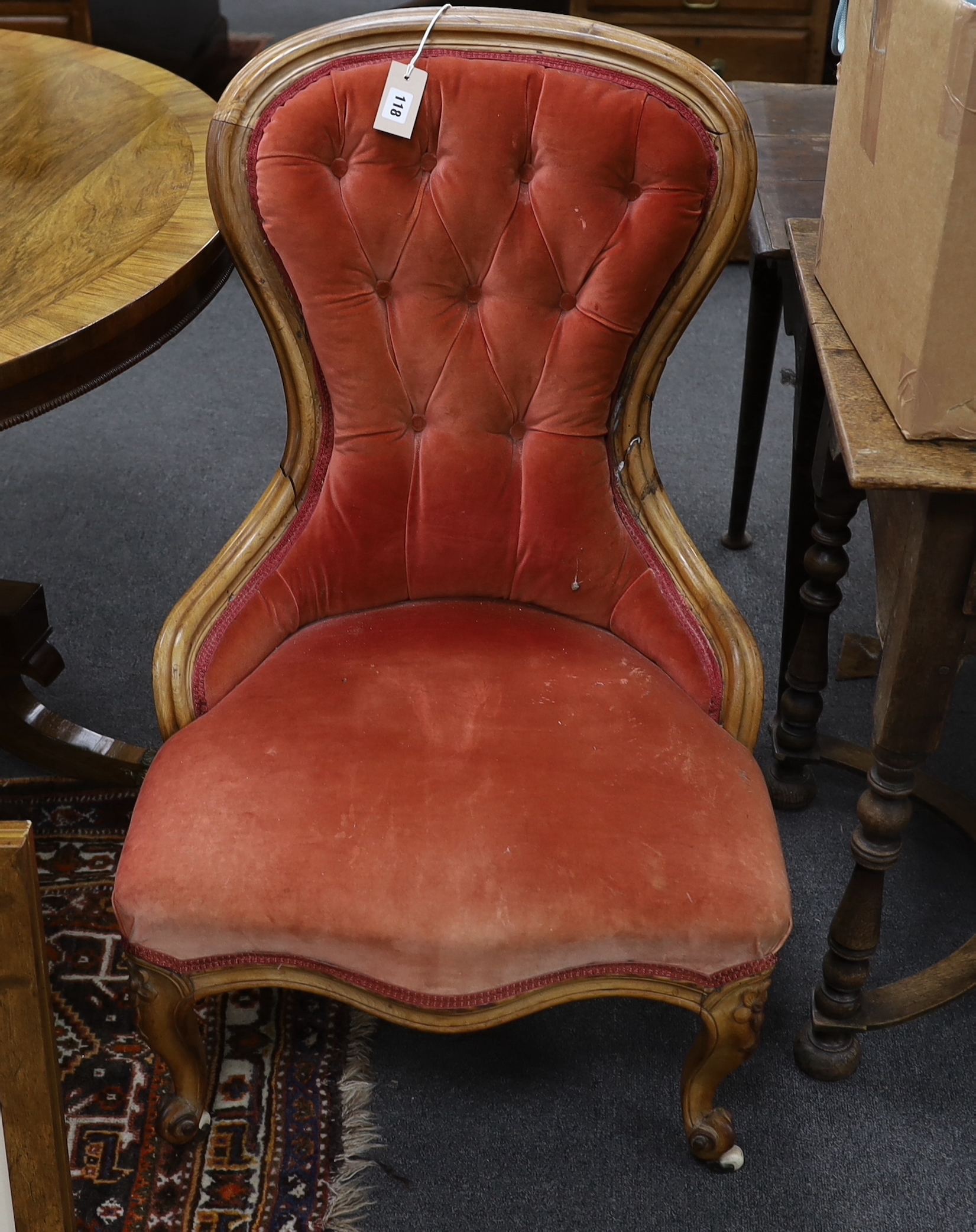 A Victorian octagonal walnut trumpet work table, height 72cm, together with a Victorian spoonback nursing chair